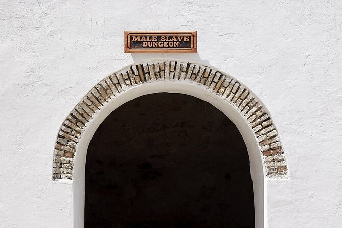 Day Tour to Kakum National Park, Cape Coast and Elmina Castles - Elmina Castle: Portuguese-built dungeons and the Door of No Return