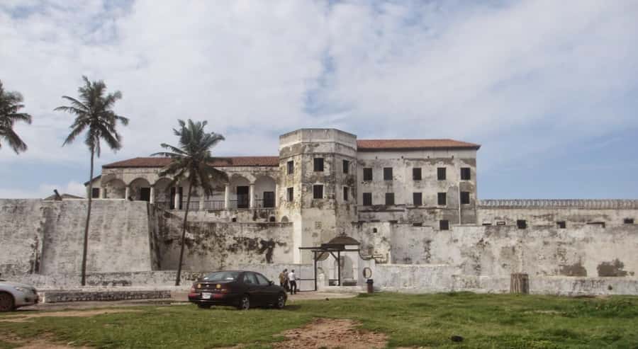 From Accra: Cape Coast Slave Dungeons Heritage Tour & Lunch - Elmina Castle: Portuguese Trading Post Origins on the Gulf of Guinea